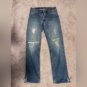 Distressed Levi’s 501 Blue Jeans